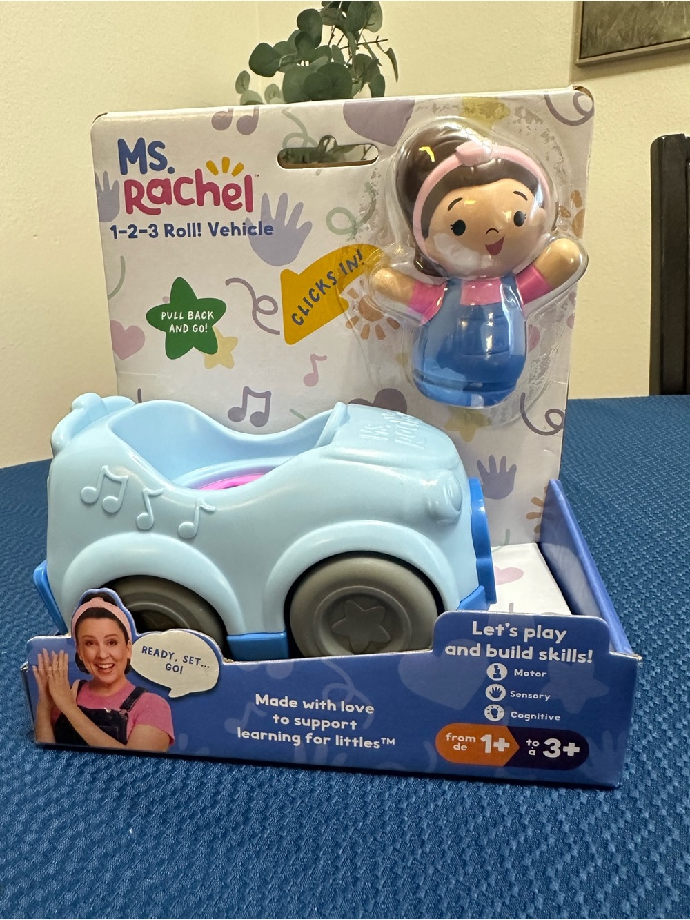 Rachel 1-2-3 Roll! Pull-Back Toy Vehicle in Light Blue with Figure